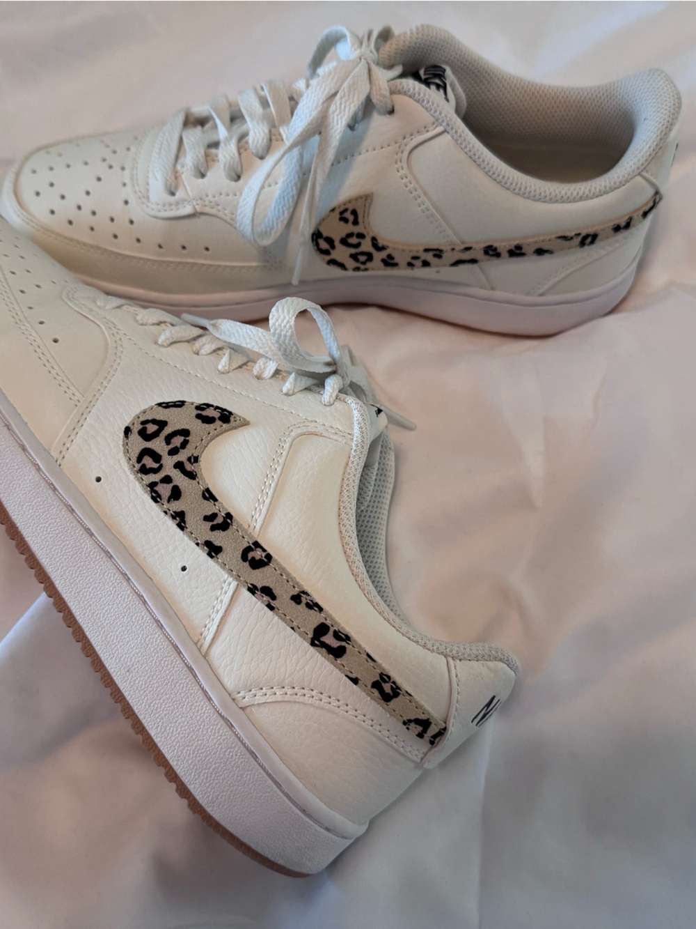 Nike Women’s White Sneakers with Leopard-Print Swoosh